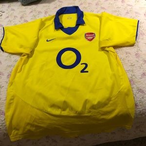 Gently used men’s soccer shirt by Nike.